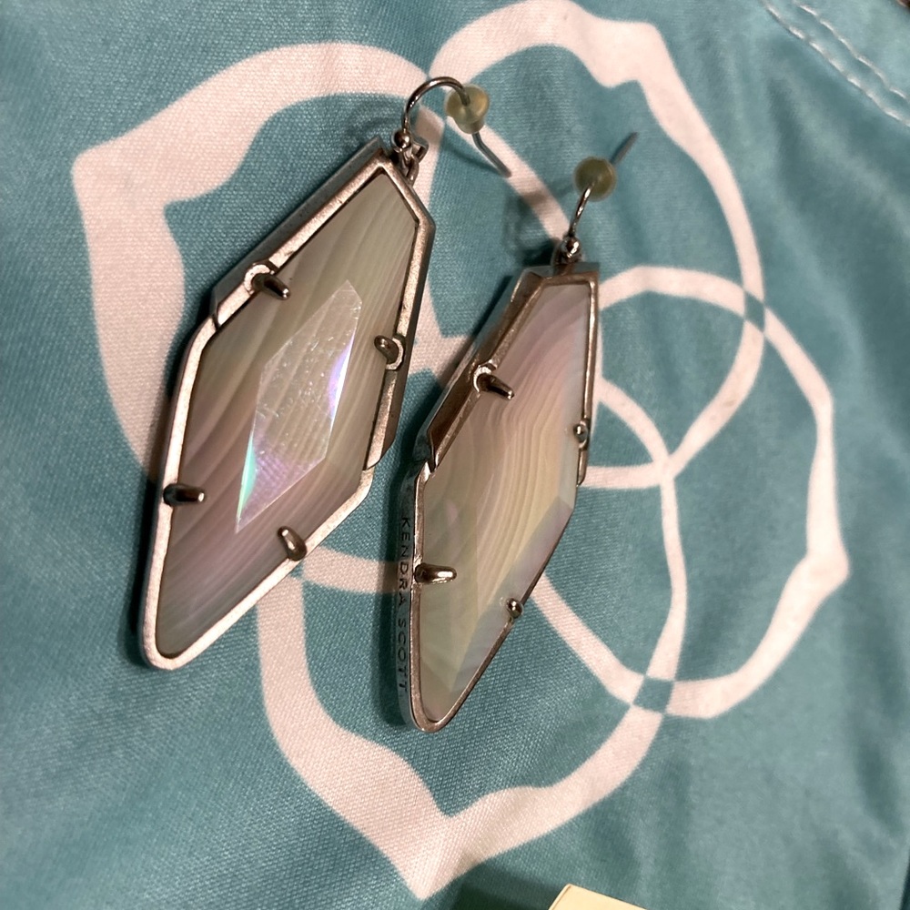 SET of Iridescent white and silver necklace and earrings.